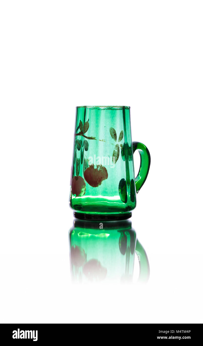 Antique green glass isolated on white backround Stock Photo