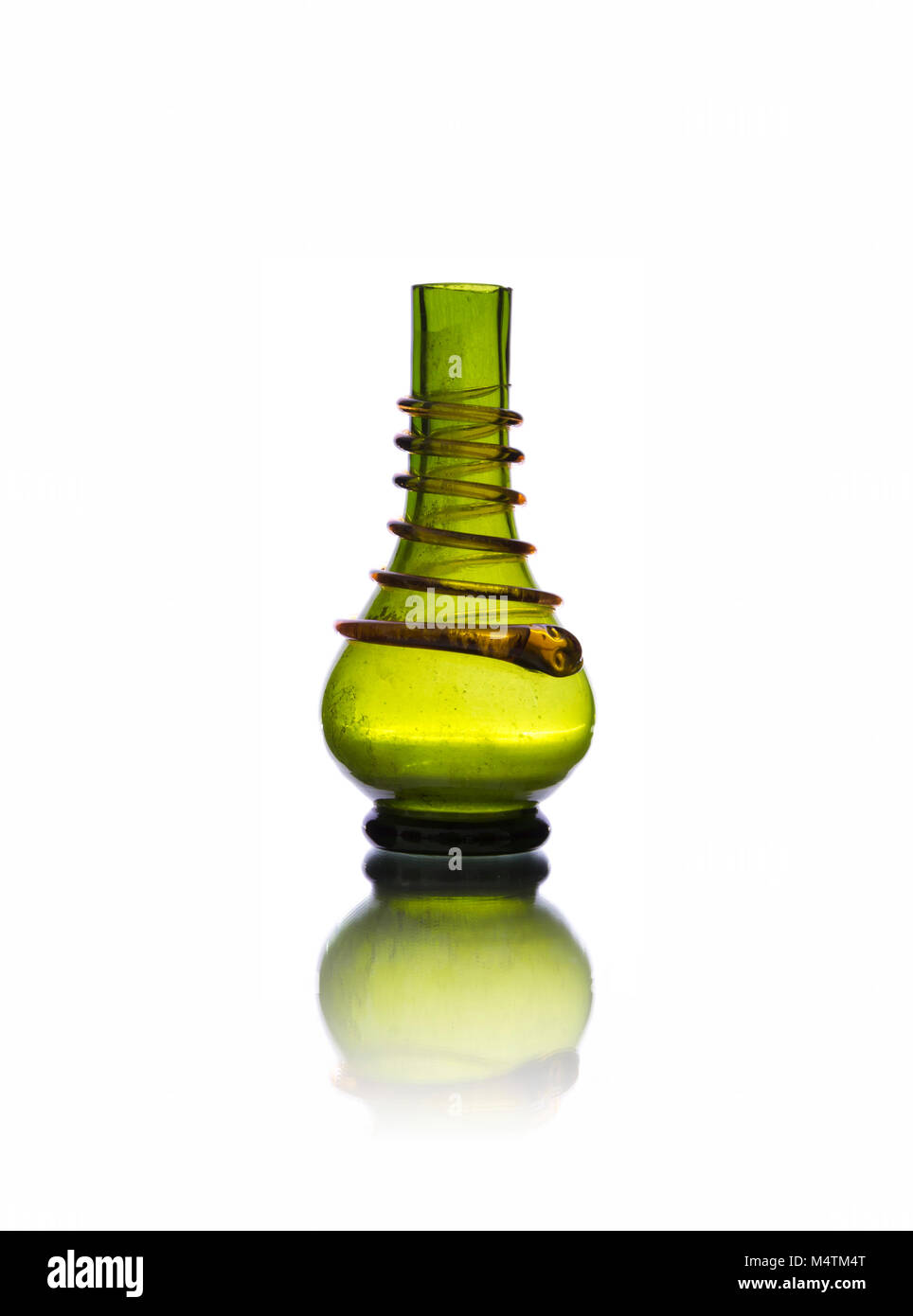 Antique green glass vase isolated on white backround Stock Photo