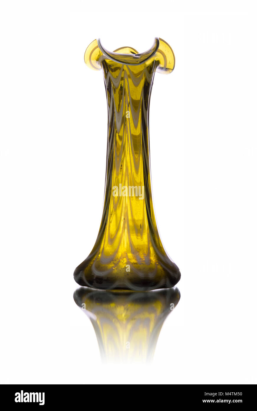 Antique yellow glass vase isolated on white backround Stock Photo