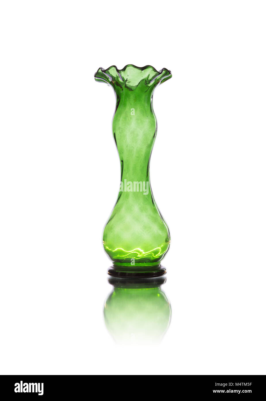 Antique green glass vase isolated on white background Stock Photo