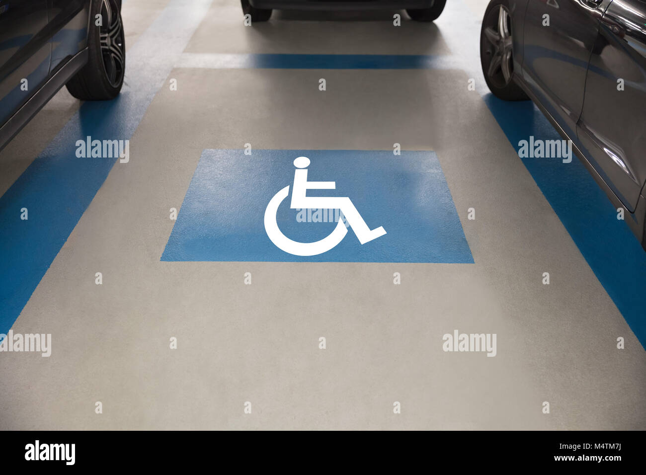 High angle view of handicap sign for parking in garage Stock Photo