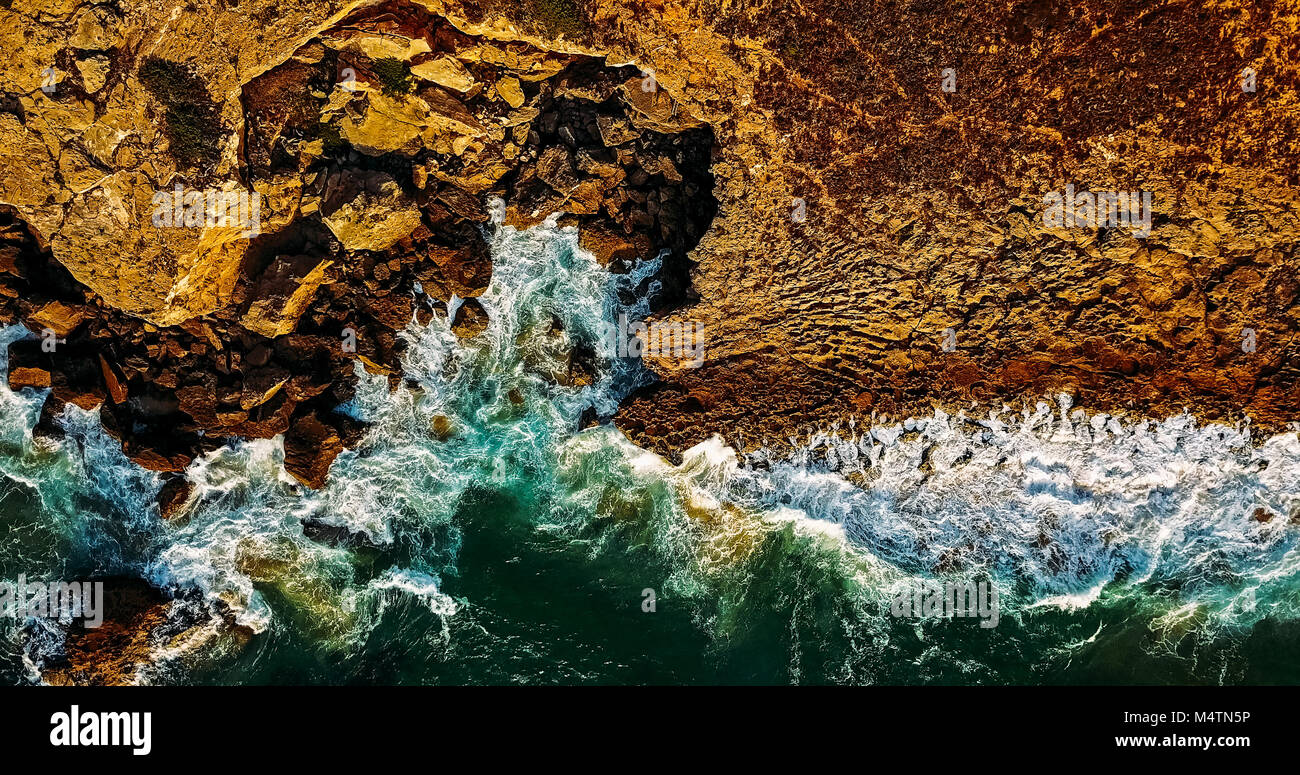 Aerial View From Flying Drone Of Ocean Waves Crushing On Rocky Beach ...
