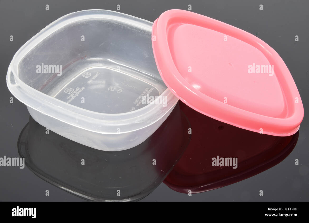 Reading, United Kingdom - February 03 2018: A small tupperware box with a  pink lid Stock Photo - Alamy