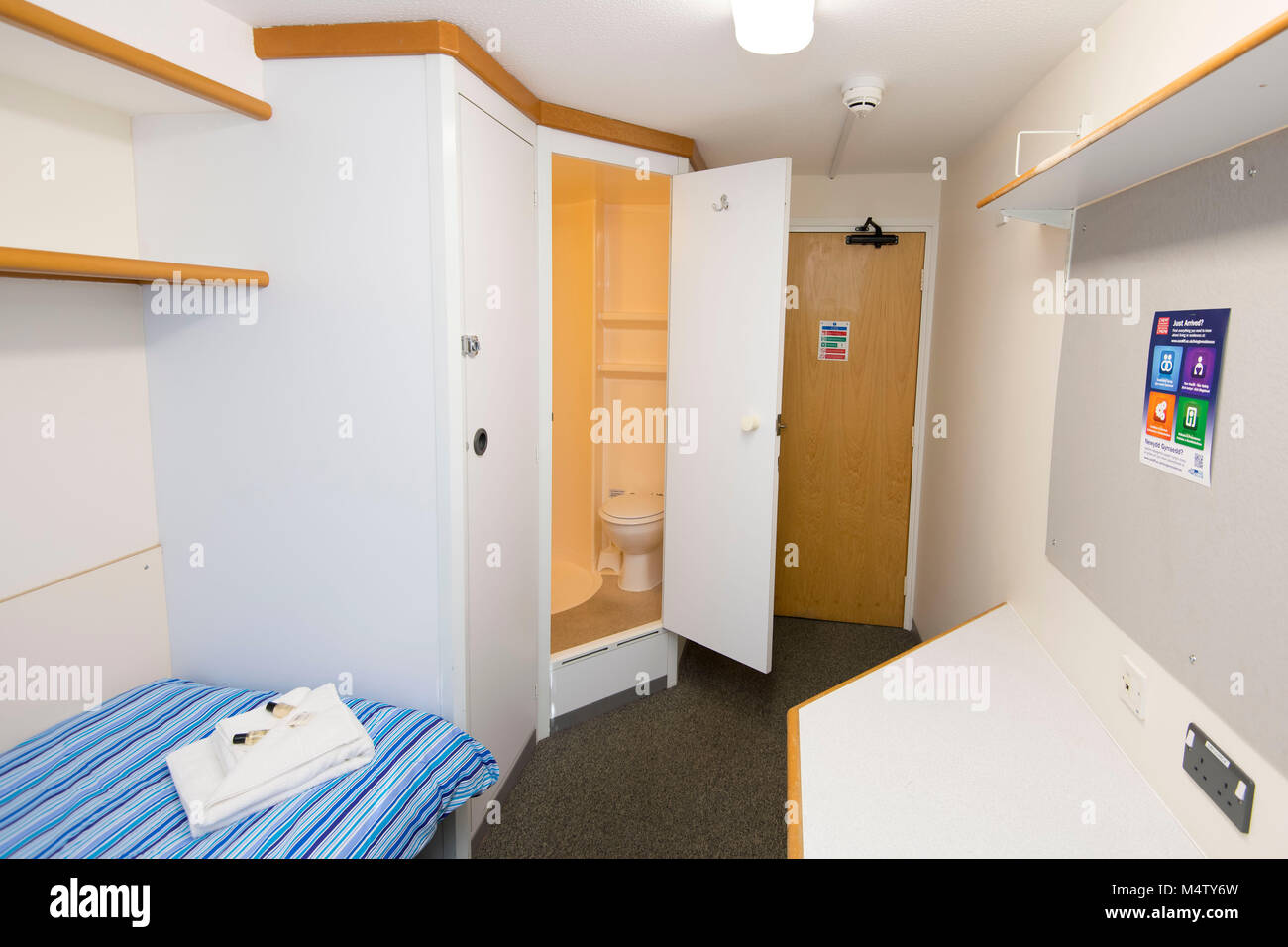 Small bedroom and study student accommodation area in university halls. Stock Photo
