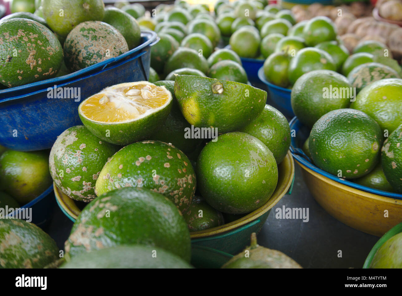 Lime on fruit bank at a farmers market stall. Stock Photo