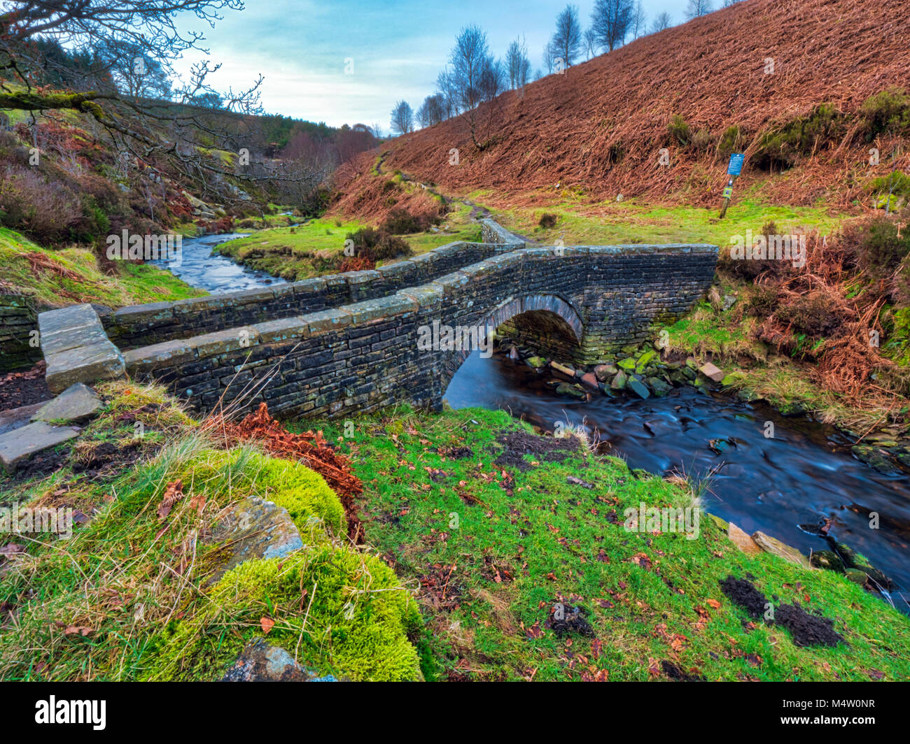 Goyt's packhorse bridge at Goytsclough on the river Goyt in the Goyt Valley, one of the most beautiful areas of the Peak District National Park lying  Stock Photo