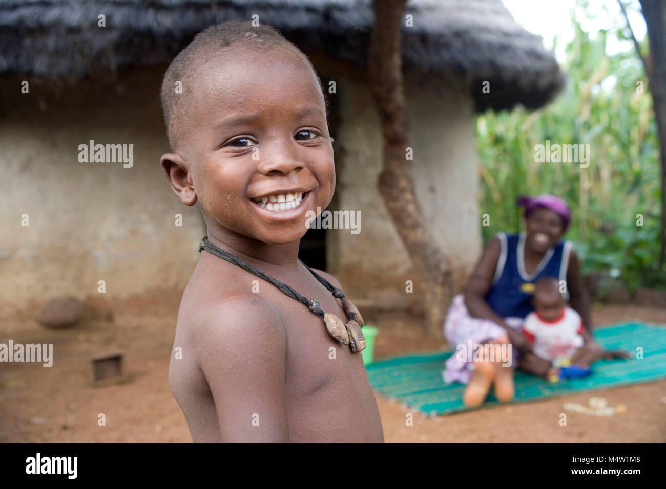Portrait of Senegalese child in rural are of Senegalsmiling boy Stock Photo