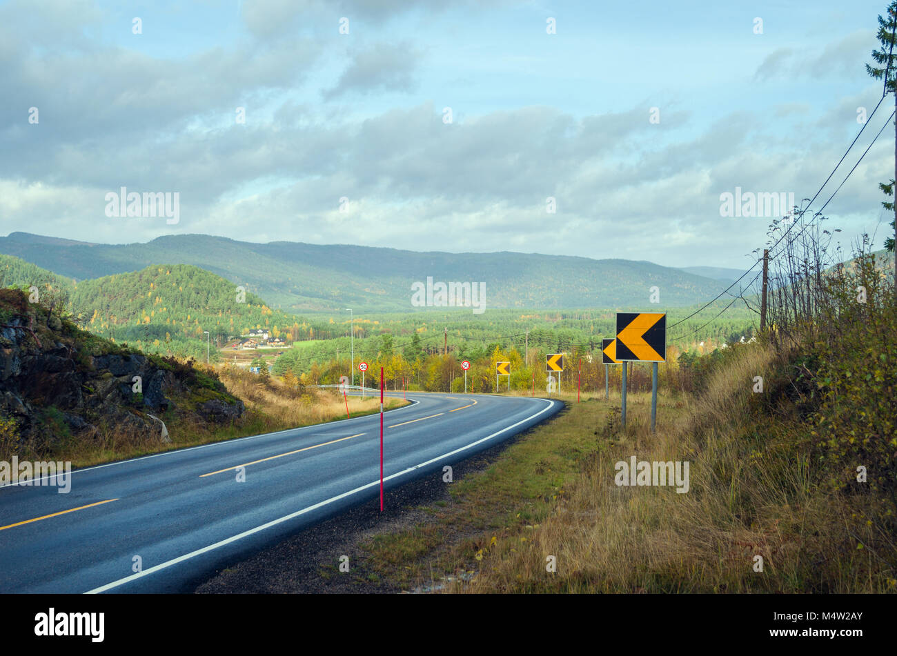 Fylkeveie 42- local road number 42- entering valley of Otra river, close to Evje in central Norway, Europe. Stock Photo