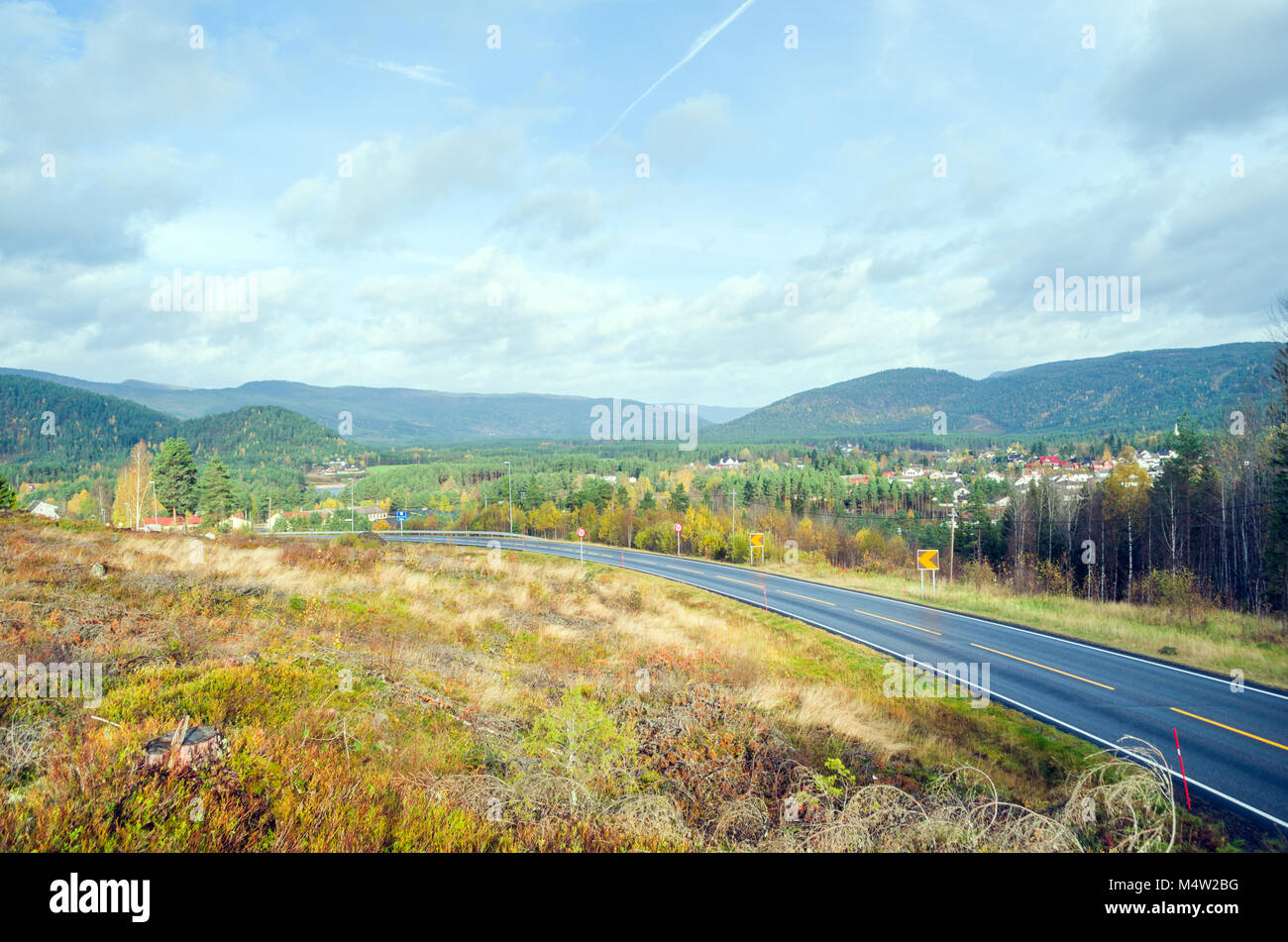 Fylkeveie 42- local road number 42- entering valley of Otra river, close to Evje in central Norway, Europe. Stock Photo