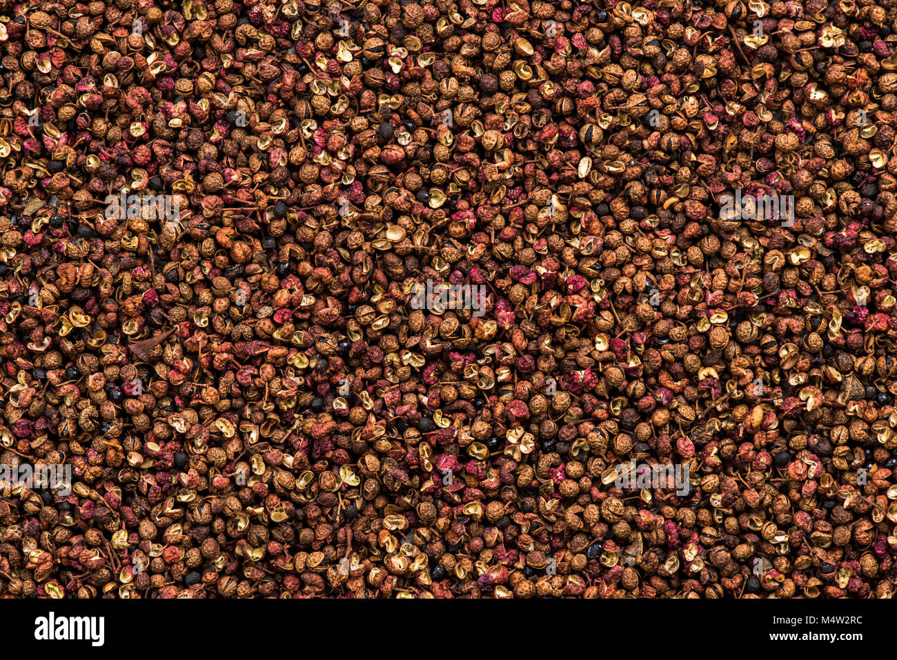 Sichuan pepper or Chinese coriander full frame background. Stock Photo