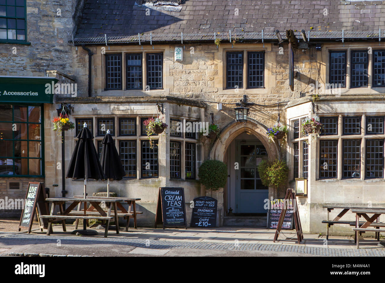BURFORD, UK - FEBRUARY 15th, 2018: Burford is a medieval town on the River Windrush in the Cotswold hills in West Oxfordshire, England. Stock Photo