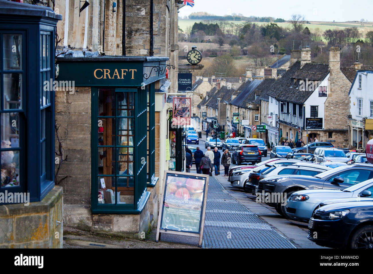 BURFORD, UK - FEBRUARY 15th, 2018: Burford is a medieval town on the River Windrush in the Cotswold hills in West Oxfordshire, England. Stock Photo