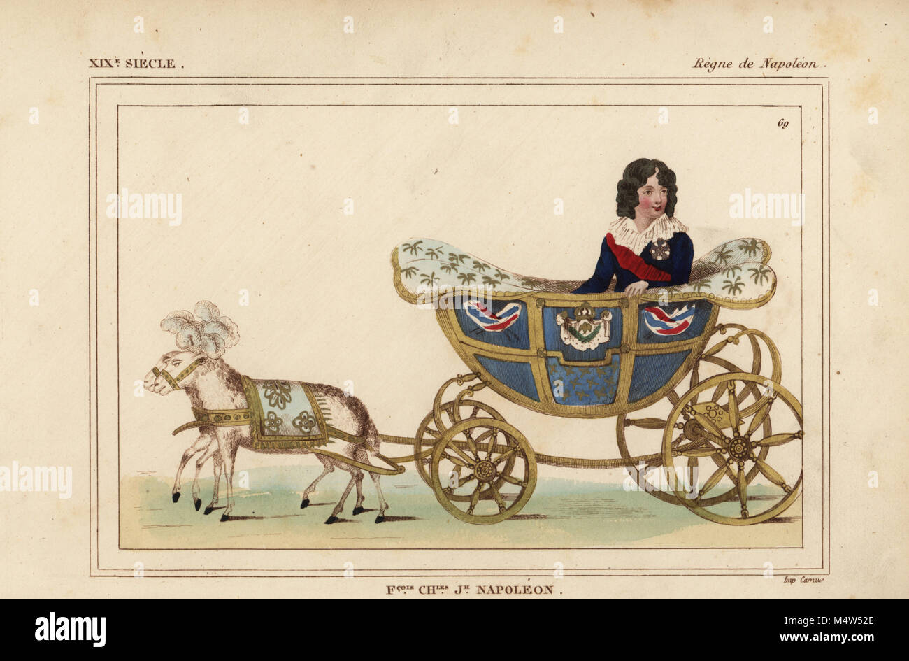 Francois Charles Joseph Napoleon, King of Rome, son of Napoleon and Marie Louise 1811-1832. Wearing the sash of the Legion d'honneur and riding In a miniature carriage. Handcoloured lithograph from Le Bibliophile Jacob aka Paul Lacroix's Costumes Historiques de la France (Historical Costumes of France), Administration de Librairie, Paris, 1852. Stock Photo