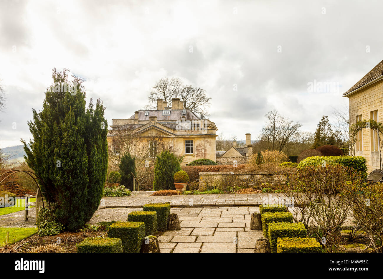 Cotswold stone Painswick House with flagstone paved patio terrace and