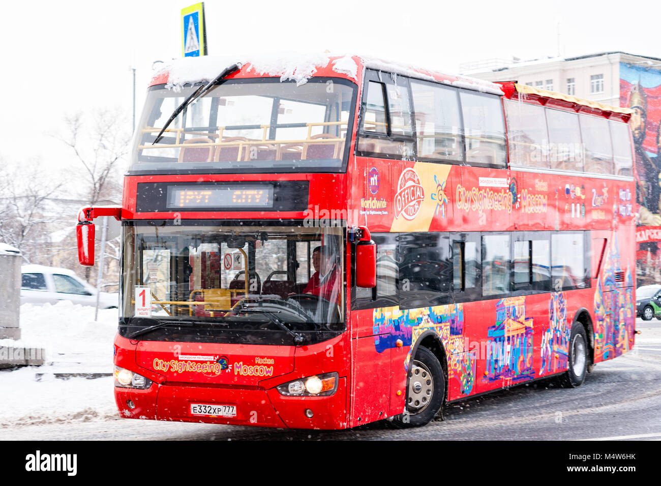 MOSCOW, February 5, 2018: Red Higer double-decker tour bus KLQ6109GS moves along the street in winter. Higer Bus is a Chinese bus manufacturer. Stock Photo