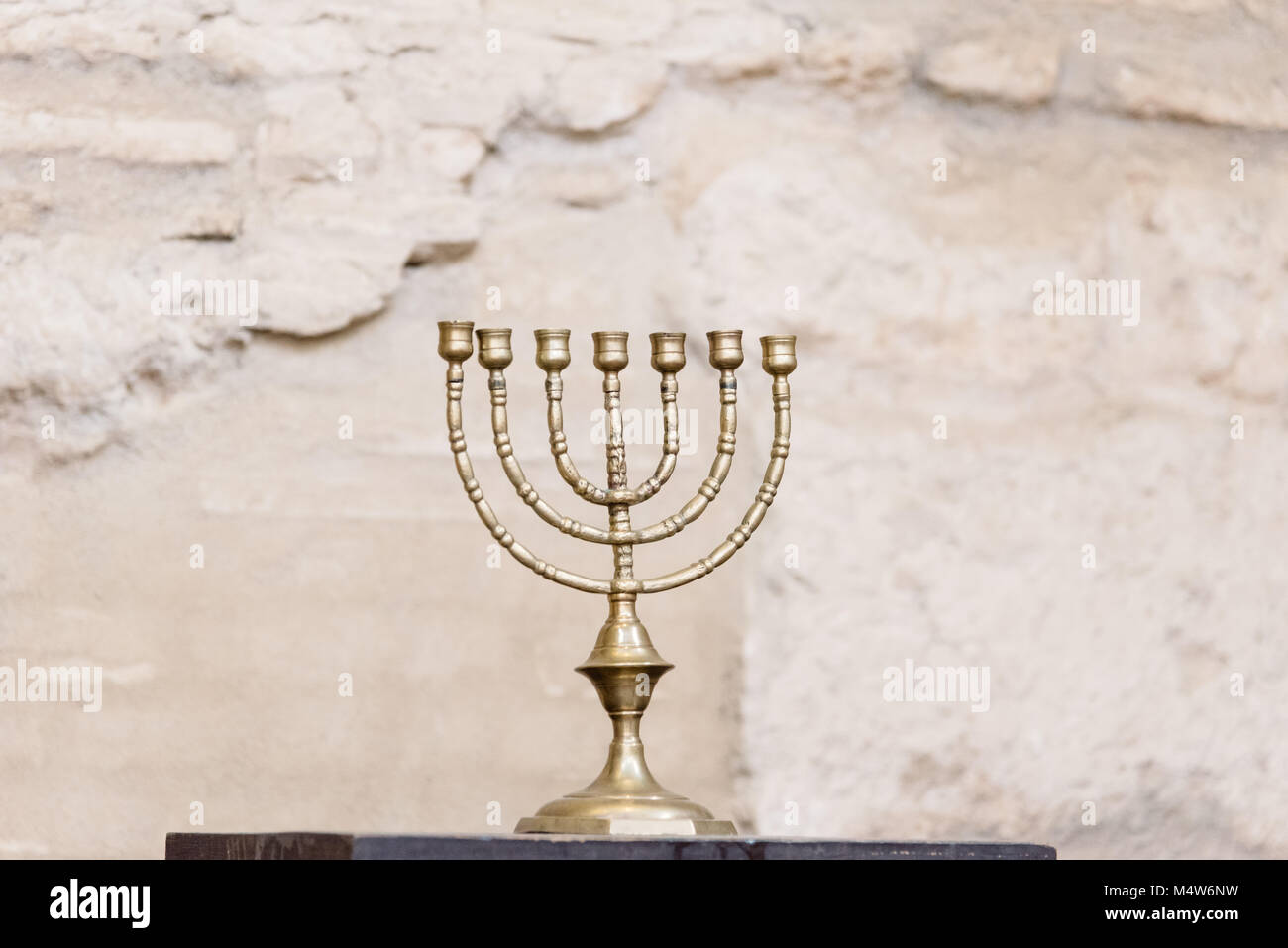 Cordoba, Spain - April 12, 2017: The menorah, the seven-lamp ancient Hebrew lampstand in the synagogue of Cordoba. Stock Photo
