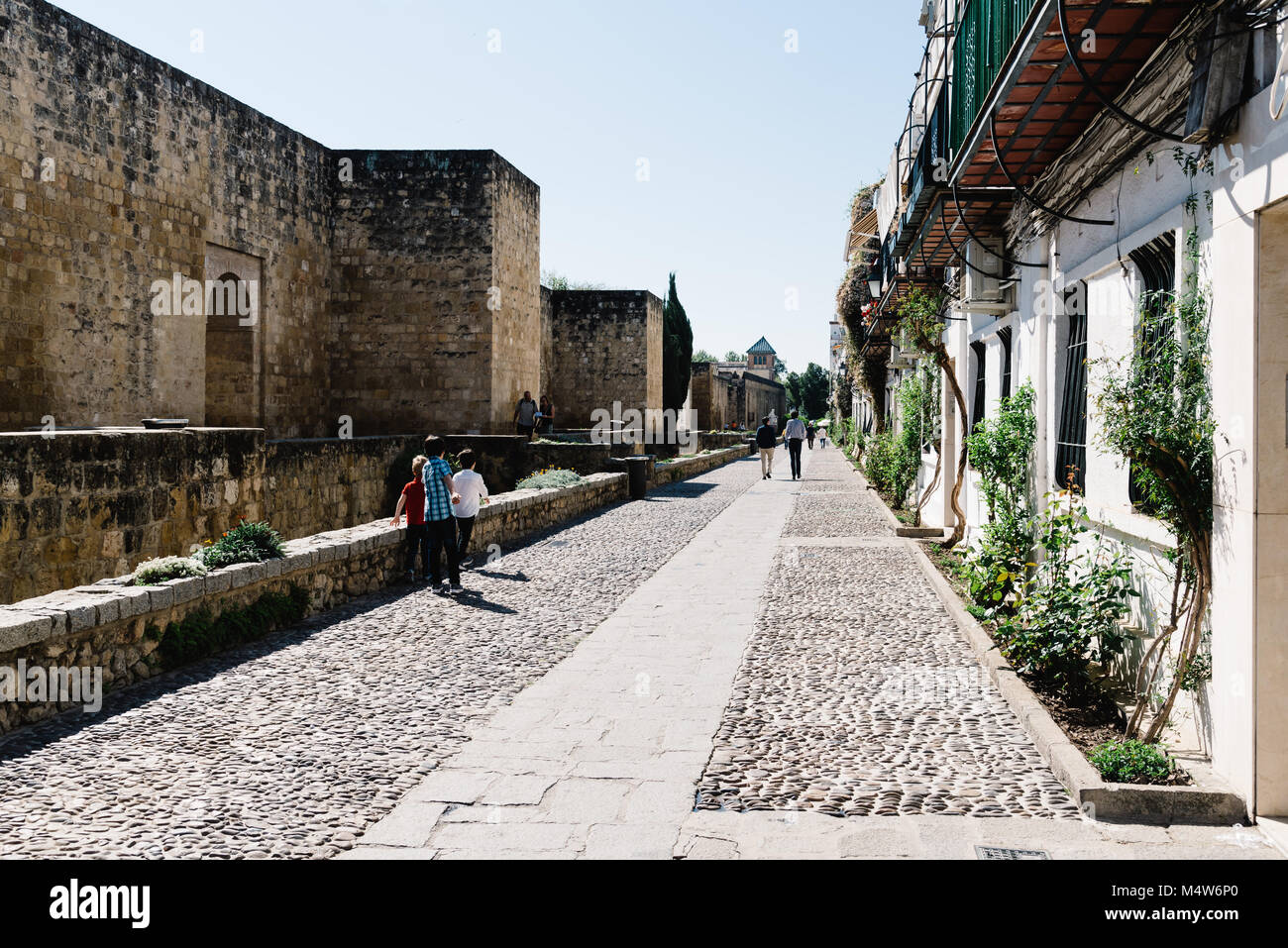 Cordoba, Spain - April 12, 2017: Old Roman Walls in Cordoba in jewish quarter. Stock Photo