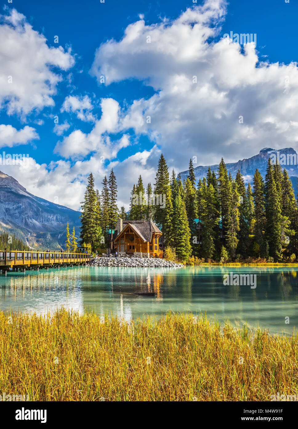 Wooden bridge over Emerald Lake Stock Photo Alamy