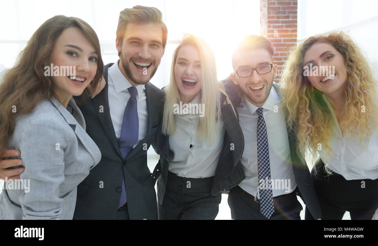 closeup.happy business team looking at camera Stock Photo - Alamy