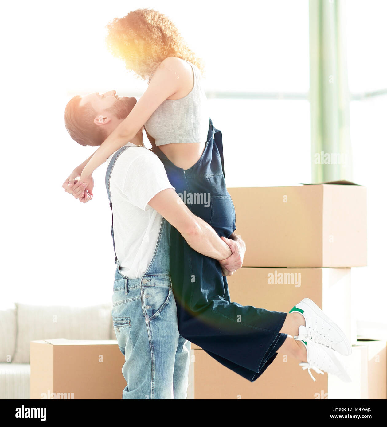 Portrait of a happy couple moving to a new house Stock Photo - Alamy
