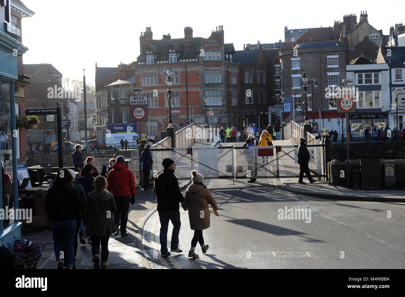 Pedestrians waiting for the Whitby swing bridge to open Stock Photo Alamy