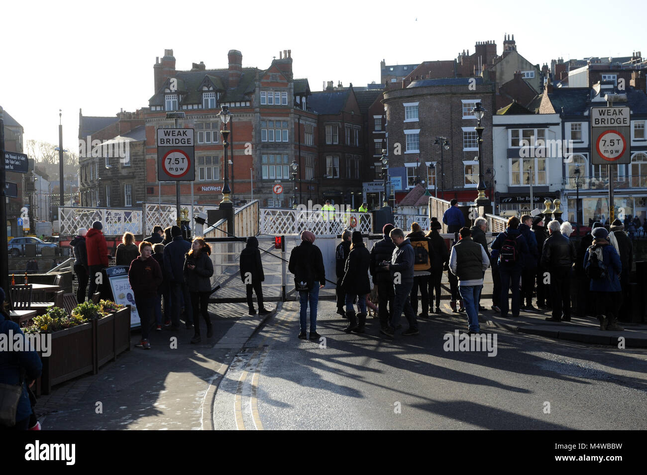Pedestrians waiting for the Whitby swing bridge to open Stock Photo Alamy