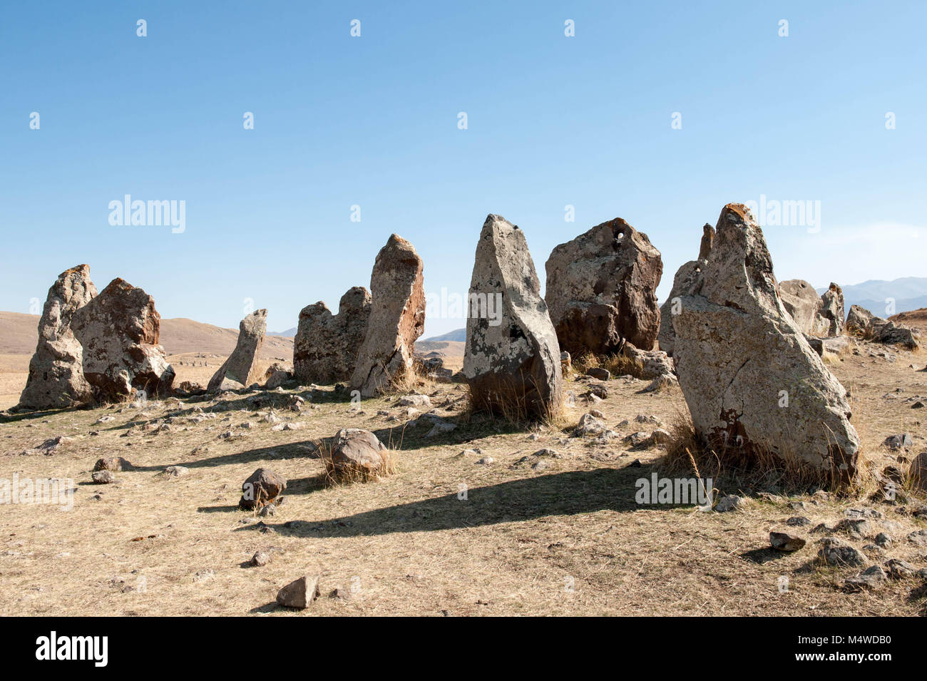 Zorats Karer or Carahunge is a prehistoric Armenian stonehenge archaeological site near the city of Sisian in the Syunik province of Armenia. Stock Photo
