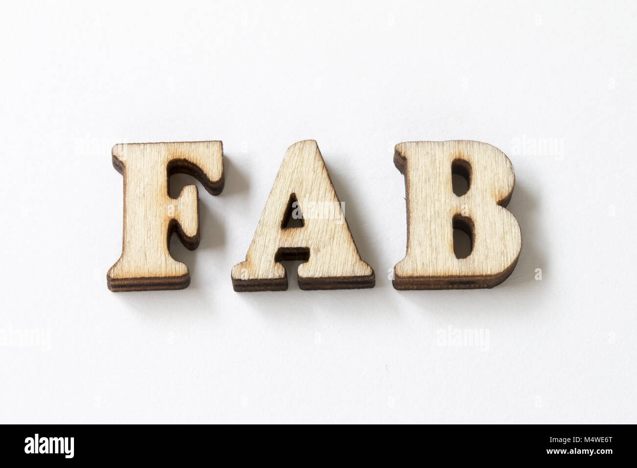 FAB, Wood letters FAB on White background,fabulous Stock Photo - Alamy