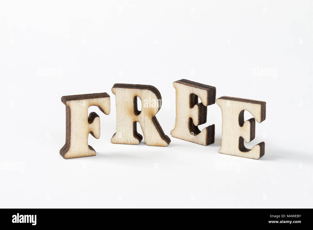 free, Wood letters FREE on White background Stock Photo - Alamy