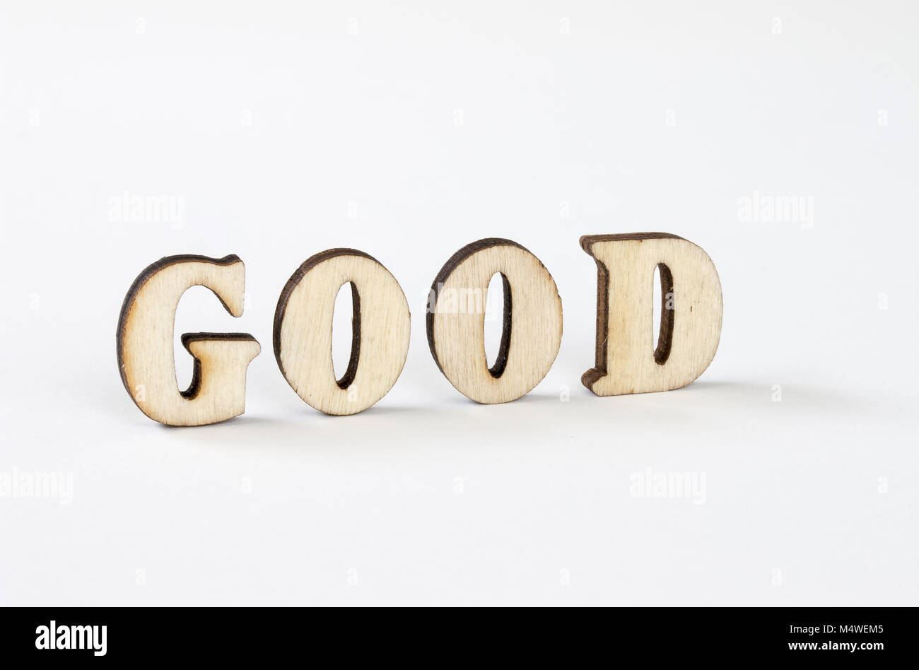 GOOD, Wood letters good on White background Stock Photo - Alamy