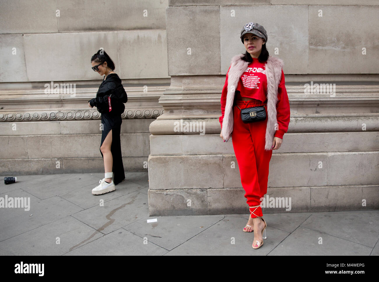 Fashion blogger Renata Soares (right), from Spain, wears Zara and Ego shoes  during the Autumn/Winter 2018 London Fashion Week outside Fashion Scout  space Stock Photo - Alamy