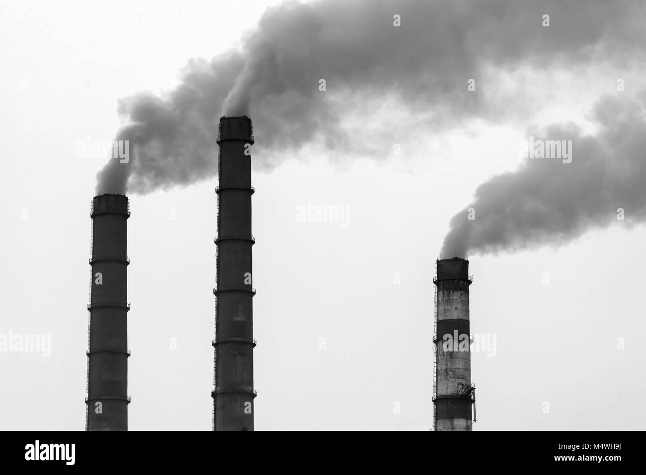 Smoke from the factory pipes. Ecological problem Stock Photo