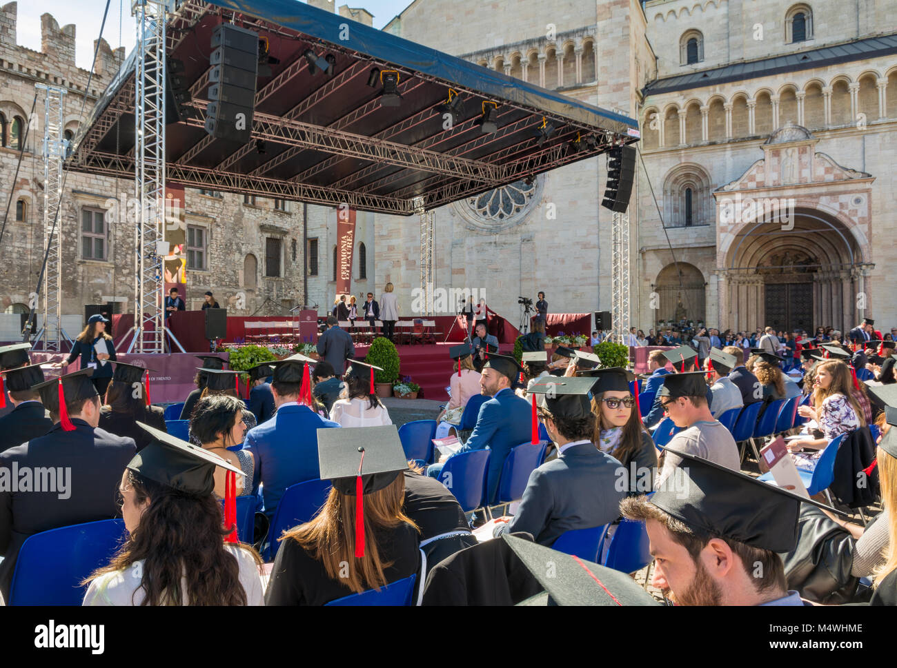 the graduation ceremony in the main square of the city of Trento. The city is famous for the prestigious universities. Stock Photo