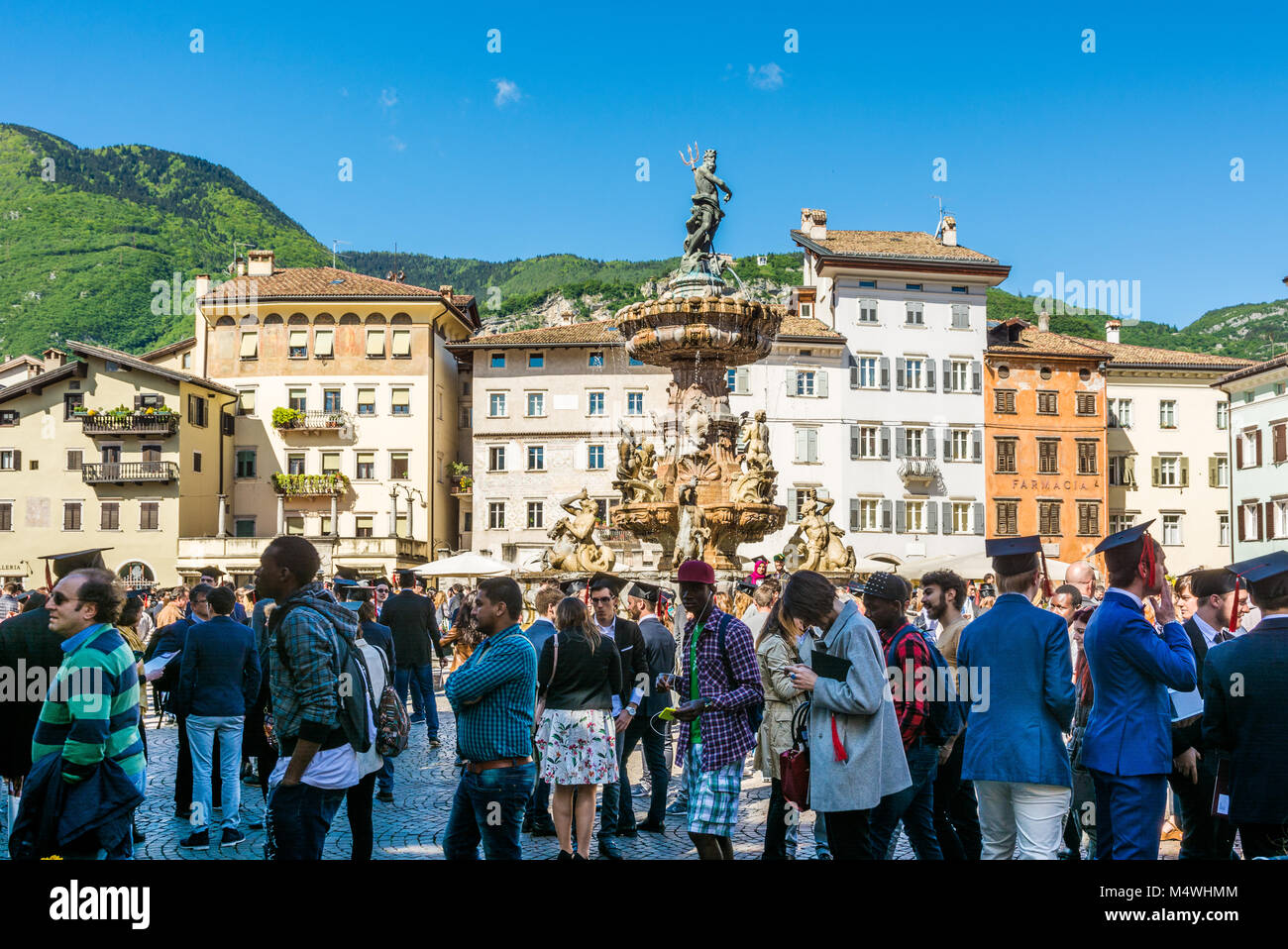 the graduation ceremony in the main square of the city of Trento. The city is famous for the prestigious universities. Stock Photo