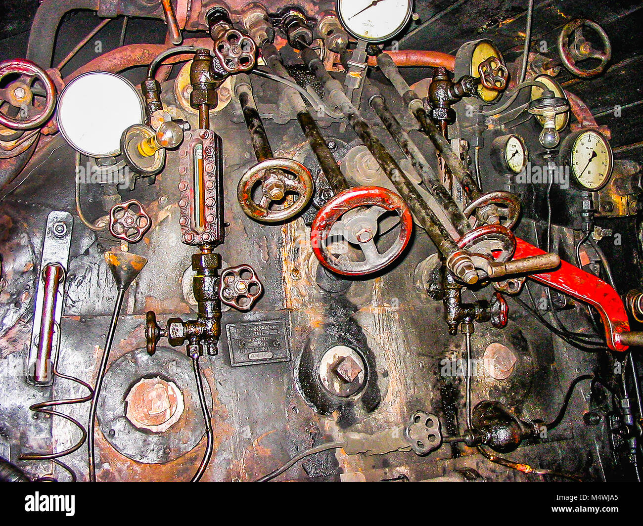 Lokomotive inside, grease shining steam machine, old machinery with all