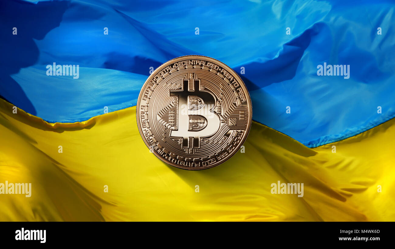 bitcoin Gold on a Ukrainian flag background. Ukraine, successfully  developing country in the crypto currency market Stock Photo - Alamy