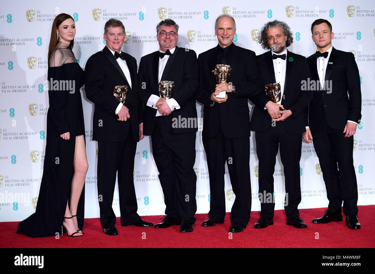Karen Gillan (left) and Taron Egerton (right) with winners of the BAFTA
