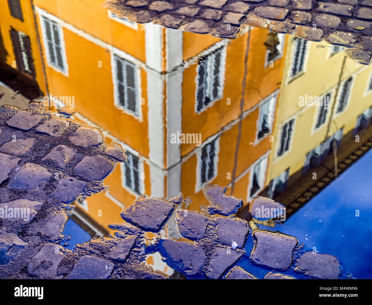 Reflection in a puddle on a Rome, Italy Stock Photo - Alamy