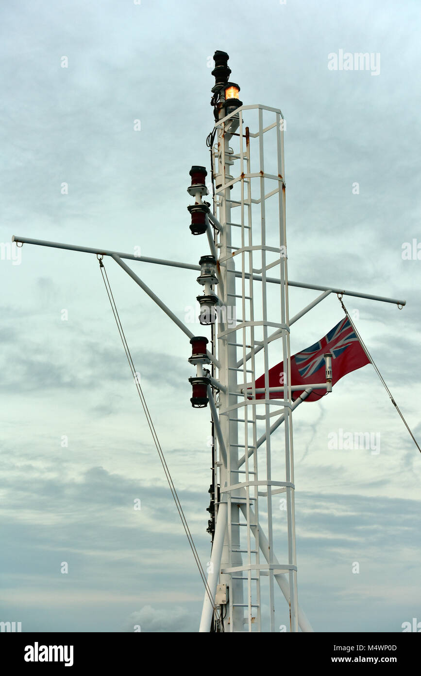 ships masthead and port and starboard navigation lights and red ensign or red duster flag. Stock Photo