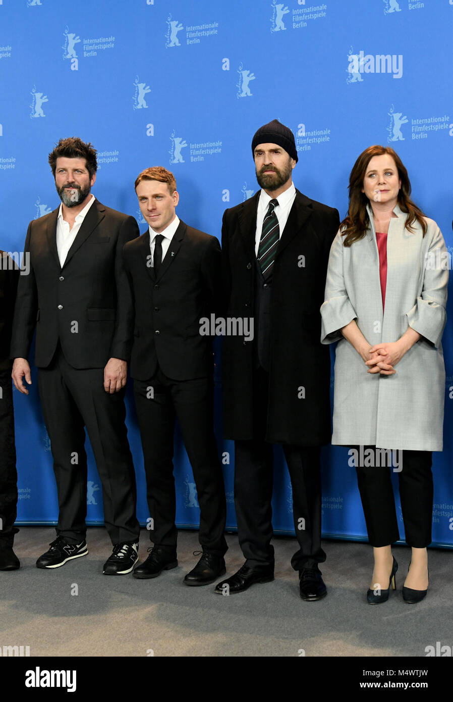 18 February 2018, Germany, Berlin: Berlinale, photo session, 'The Happy Prince': The actors John Conroy (L-R), Edwin Thomas, director Rupert Everett and the actress Emily Watson. The film is competing in the category 'Berlinale Special Gala' as part of the 68th international Berlin film festival. Photo: Jens Kalaene/dpa-Zentralbild/dpa Credit: dpa picture alliance/Alamy Live News Stock Photo