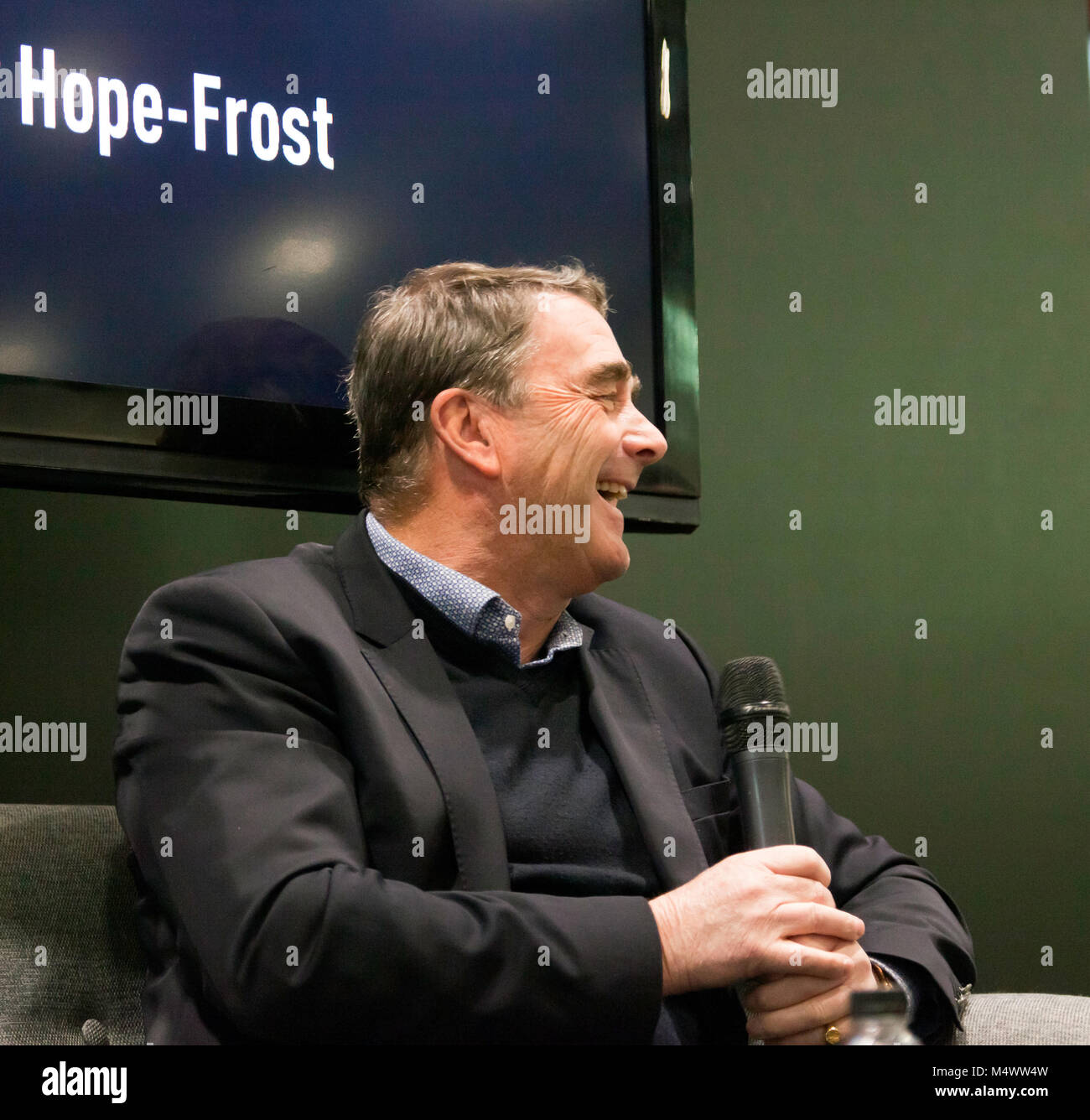 Nigel Mansell CBE, being interviewed  by Henry Hope-Frost in the Supagard Theatre, during the 2018 London Classic Car Show Stock Photo
