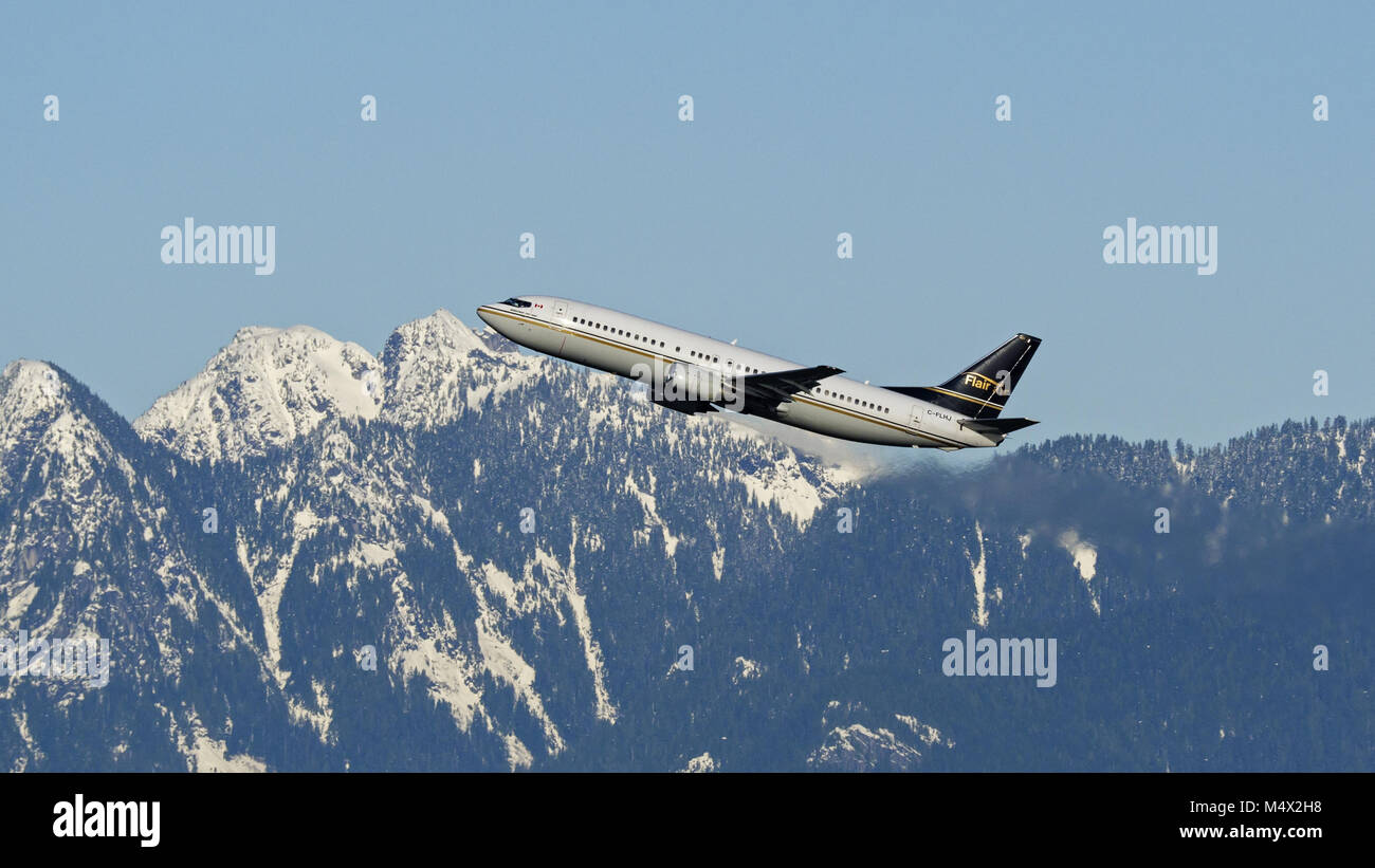 Richmond, British Columbia, Canada. 1st Jan, 2018. A Flair Airlines Boeing 737-400 (C-FLHJ) single-aisle narrow-body jet airliner takes off from Vancouver International Airport. The airline is Canada's first ultra low-cost carrier Credit: Bayne Stanley/ZUMA Wire/Alamy Live News Stock Photo