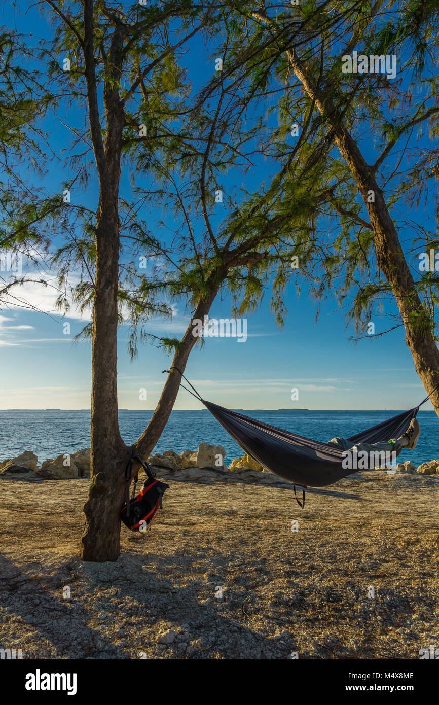 USA, Florida, Relaxing on holidays in a hammock at key west beach at sunset Stock Photo Alamy