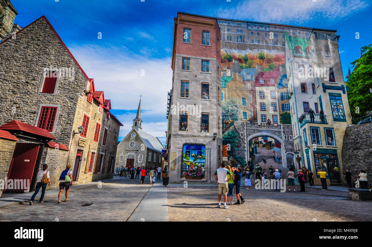 Mural in Old Québec’s Place-Royale recounts the story of Québec City. Stock Photo