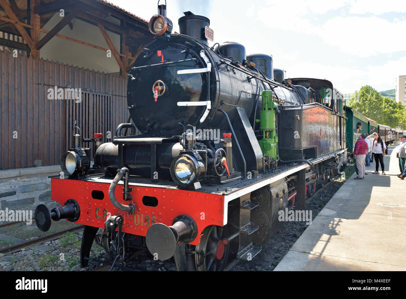 Historic railway steam locomotive in the station of Douro town Peso da Régua Stock Photo