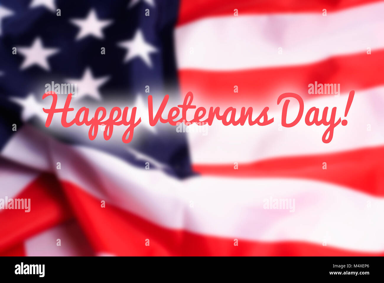 Happy Veterans Day sign on USA flag background Stock Photo - Alamy