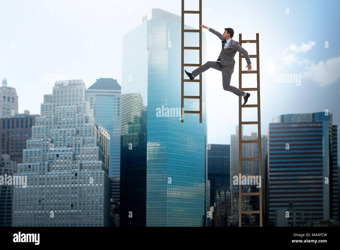 Businessman climbing career ladder in business concept Stock Photo - Alamy