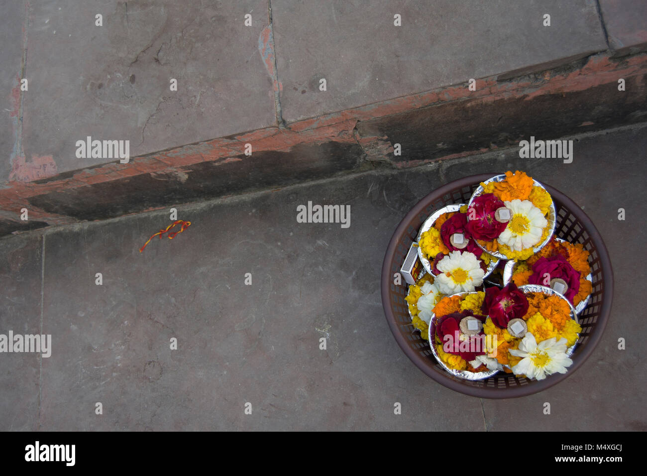 Flowers to throw in the river Stock Photo Alamy