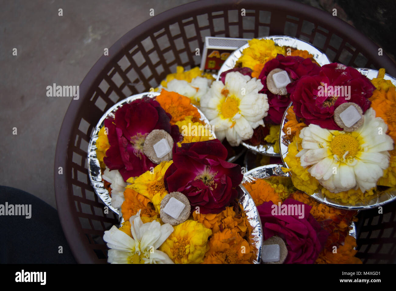 Flowers to throw in the river Stock Photo Alamy