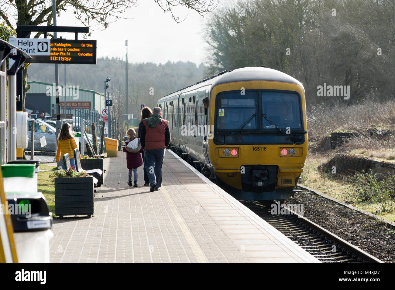 A Great Western Railway class 165 diesel train leaving Hanborough
